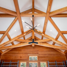 luxury home in Andover, Vermont lookup view of post and beam cathedral ceiling